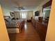 Spacious bedroom with wood floors and ceiling fan at 4869 Independence Dr # 4869, Bradenton, FL 34210