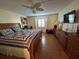 Main bedroom with dresser and king-size bed at 4869 Independence Dr # 4869, Bradenton, FL 34210