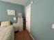 Bedroom with double bed, dresser, and closet at 4869 Independence Dr # 4869, Bradenton, FL 34210