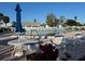 Relaxing community pool with ample lounge chairs and tables at 4869 Independence Dr # 4869, Bradenton, FL 34210