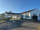 Condo building with carport and landscaping at 4869 Independence Dr # 4869, Bradenton, FL 34210