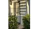 Inviting condo entrance with lush landscaping at 4869 Independence Dr # 4869, Bradenton, FL 34210