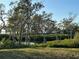 Serene waterfront view with lush vegetation at 4869 Independence Dr # 4869, Bradenton, FL 34210