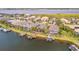 Aerial view of waterfront homes with private docks and swimming pools at 5125 Tidewater Preserve Blvd, Bradenton, FL 34208