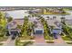 Aerial photo of two homes with attached garages and a shared driveway at 5125 Tidewater Preserve Blvd, Bradenton, FL 34208