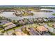 Aerial view showcasing a waterfront community with upscale homes and canals at 5125 Tidewater Preserve Blvd, Bradenton, FL 34208