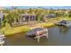 Private boat dock with covered boat lift and spacious backyard at 5125 Tidewater Preserve Blvd, Bradenton, FL 34208