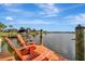 Relax on the dock with two Adirondack chairs and enjoy the water views at 5125 Tidewater Preserve Blvd, Bradenton, FL 34208