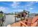 Private boat dock with lift, providing convenient access to the water at 5125 Tidewater Preserve Blvd, Bradenton, FL 34208