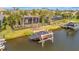 Private boat dock with covered boat lift and waterfront access at 5125 Tidewater Preserve Blvd, Bradenton, FL 34208