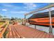 Convenient boat dock with lift and seating area for relaxing at 5125 Tidewater Preserve Blvd, Bradenton, FL 34208