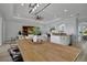 Farmhouse-style dining area with view to living room and kitchen at 5125 Tidewater Preserve Blvd, Bradenton, FL 34208