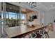 Farmhouse style dining area with sliding doors leading to a screened porch at 5125 Tidewater Preserve Blvd, Bradenton, FL 34208