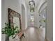 Bright and airy entryway with a view to the backyard at 5125 Tidewater Preserve Blvd, Bradenton, FL 34208