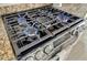 Stainless steel gas cooktop with five burners at 5125 Tidewater Preserve Blvd, Bradenton, FL 34208