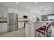 Modern kitchen with stainless steel appliances and granite countertops at 5125 Tidewater Preserve Blvd, Bradenton, FL 34208