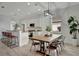 Bright kitchen with granite countertops, stainless steel appliances, and an island at 5125 Tidewater Preserve Blvd, Bradenton, FL 34208