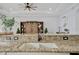Double kitchen sink with granite countertop at 5125 Tidewater Preserve Blvd, Bradenton, FL 34208