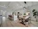 Modern kitchen with island and farmhouse dining table at 5125 Tidewater Preserve Blvd, Bradenton, FL 34208