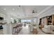 Open concept kitchen and living area with water views at 5125 Tidewater Preserve Blvd, Bradenton, FL 34208