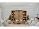 Living room featuring a rustic wooden media console at 5125 Tidewater Preserve Blvd, Bradenton, FL 34208