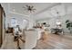 Open floor plan showcasing living room, kitchen, and dining area at 5125 Tidewater Preserve Blvd, Bradenton, FL 34208