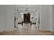 Home office with glass-top desk and built-ins at 5125 Tidewater Preserve Blvd, Bradenton, FL 34208