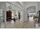 Home office with glass-top desk and built-ins at 5125 Tidewater Preserve Blvd, Bradenton, FL 34208