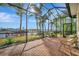 Enjoy waterfront views from this screened patio, complete with comfortable seating at 5125 Tidewater Preserve Blvd, Bradenton, FL 34208