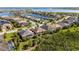 Aerial view of waterfront community with numerous houses at 5203 Lake Overlook Ave, Bradenton, FL 34208