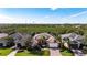 Aerial view of houses and lush green landscape at 5203 Lake Overlook Ave, Bradenton, FL 34208