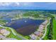 Aerial view of upscale community with lake, marina, and homes at 5203 Lake Overlook Ave, Bradenton, FL 34208