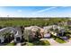 Houses with tile roofs and lush landscaping at 5203 Lake Overlook Ave, Bradenton, FL 34208