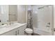 Clean bathroom with a shower/tub combo and modern vanity at 5203 Lake Overlook Ave, Bradenton, FL 34208