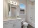 Bathroom with single sink vanity, toilet and bathtub at 5203 Lake Overlook Ave, Bradenton, FL 34208