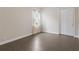 Bright bedroom with tile floors and a spacious closet at 5203 Lake Overlook Ave, Bradenton, FL 34208