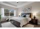 Spacious bedroom with plush bedding and large window at 5203 Lake Overlook Ave, Bradenton, FL 34208