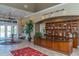 Lobby with high ceilings, a large desk, and built-in shelves at 5203 Lake Overlook Ave, Bradenton, FL 34208
