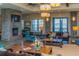 Relaxing community room with a stone fireplace and comfortable seating at 5203 Lake Overlook Ave, Bradenton, FL 34208