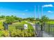 Fenced dog park with seating and waste disposal at 5203 Lake Overlook Ave, Bradenton, FL 34208