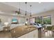 Modern kitchen with granite countertops and stainless steel appliances at 5203 Lake Overlook Ave, Bradenton, FL 34208