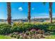 Scenic marina view with lush landscaping and flowers at 5203 Lake Overlook Ave, Bradenton, FL 34208