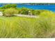 Serene nature preserve with native grasses and signage at 5203 Lake Overlook Ave, Bradenton, FL 34208