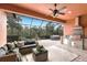 Outdoor kitchen with grill, sink and seating area at 5203 Lake Overlook Ave, Bradenton, FL 34208