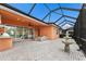 Outdoor patio with seating area, fountain, and covered lanai at 5203 Lake Overlook Ave, Bradenton, FL 34208