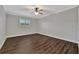 Spacious bedroom with wood flooring and ceiling fan at 5800 Hollywood Blvd # 115, Sarasota, FL 34231