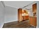 Small galley kitchen with wood cabinets at 5800 Hollywood Blvd # 115, Sarasota, FL 34231