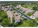 Aerial perspective of the villa community, showcasing its layout and landscaping at 5958 Clubside Dr, Sarasota, FL 34243