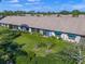 Aerial view showcasing the property's location and landscaping at 5958 Clubside Dr, Sarasota, FL 34243