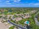 Community overview featuring villas, pool, and golf course at 5958 Clubside Dr, Sarasota, FL 34243